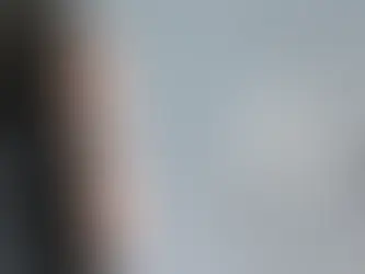 Technician replacing a cracked phone screen with new display assembly