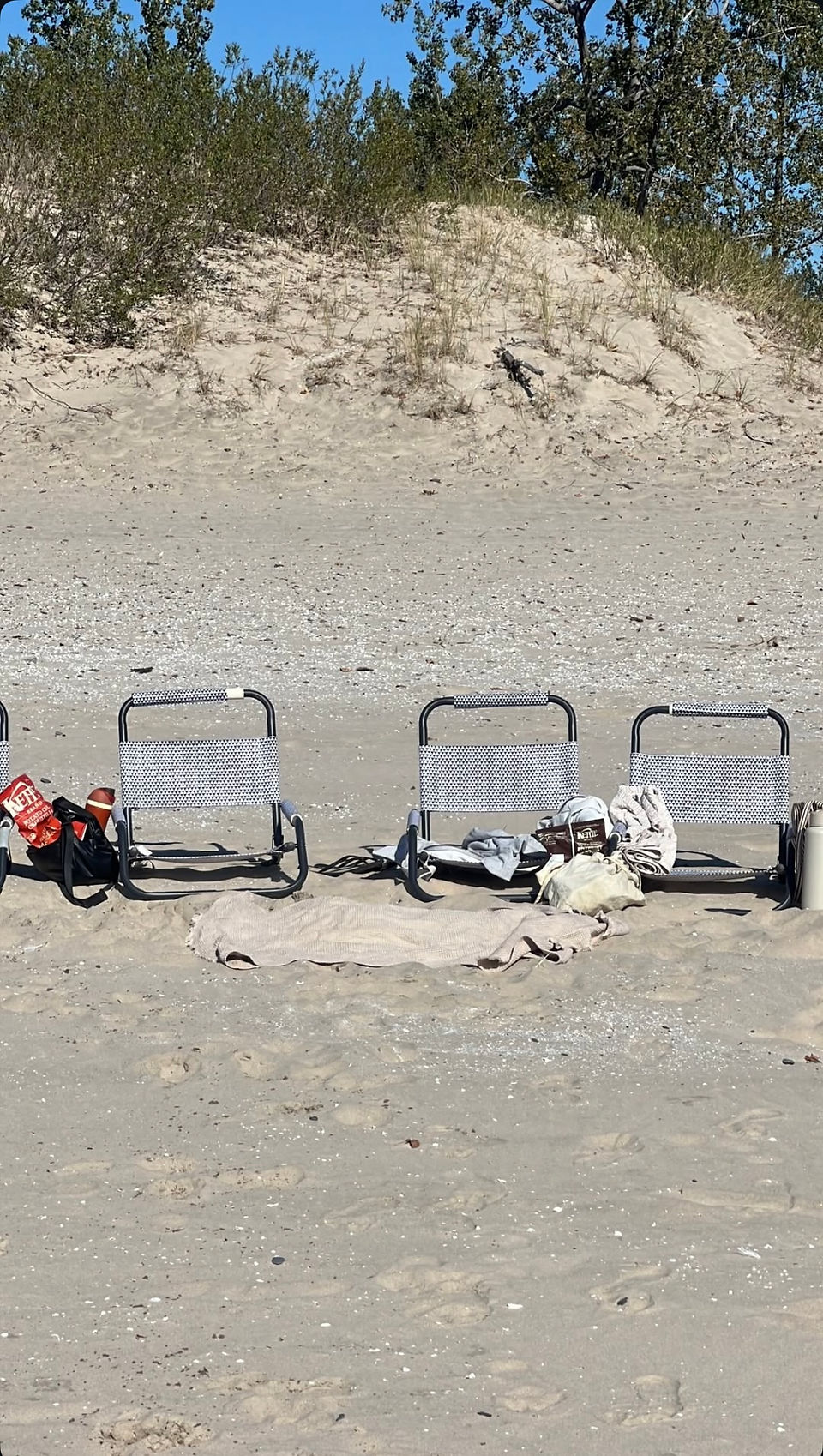 Cute beach chairs and picnic set up at Sandbanks Beach 
