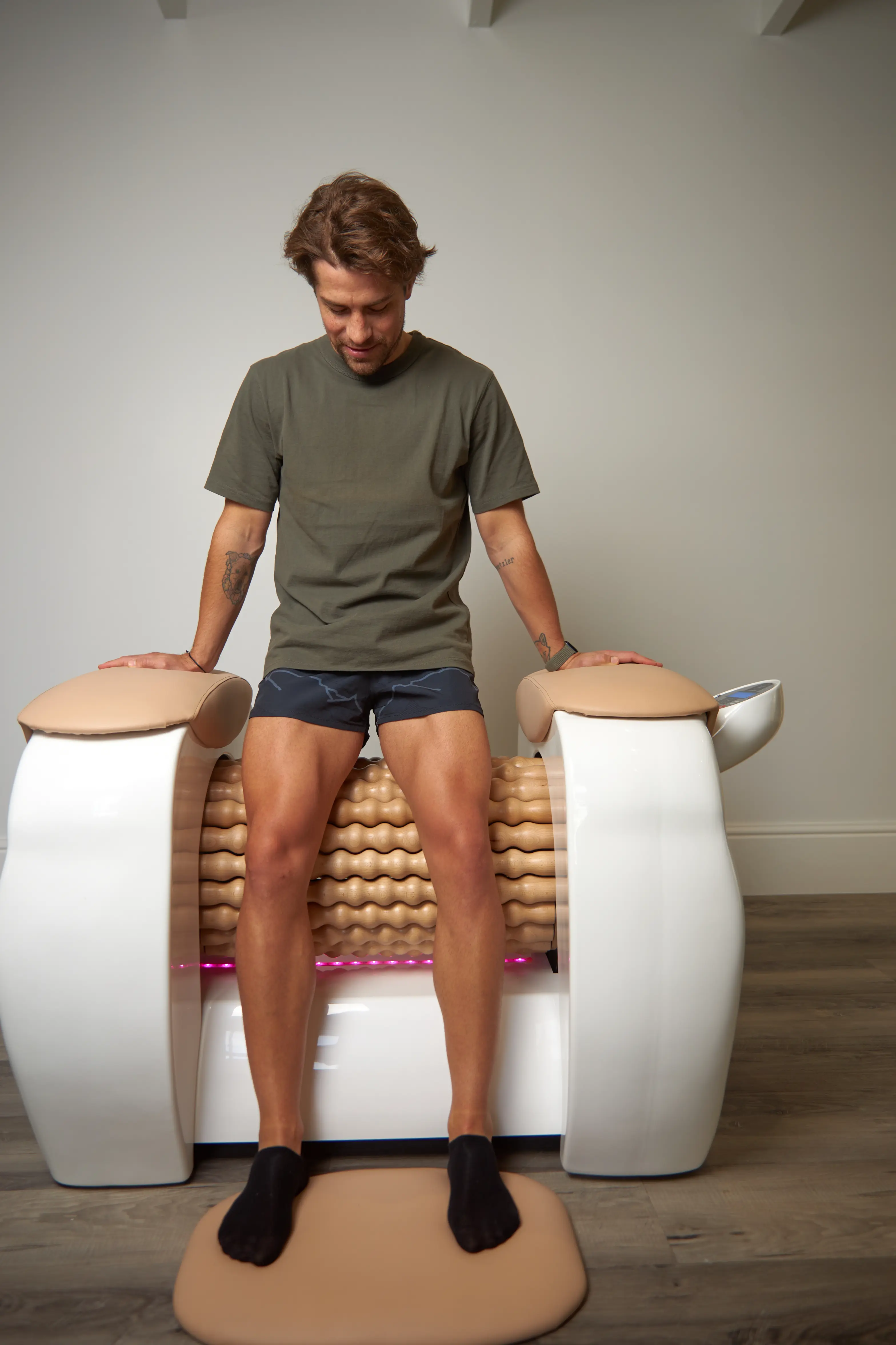 Male using BODYROLL machine