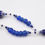 Miniature : Collier sautoir perles de verre Afrique perles à chevron bleu trade beads Cocagne de sort