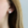 Hand made sterling silver faceted earring studs worn by model made by Gerlinde Huth London