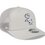 Thumbnail: A New Era Brand 9Seventy Stretch Snapback Hat in a Stone color that features a primary White sox logo at the front and a trucker style mesh back.