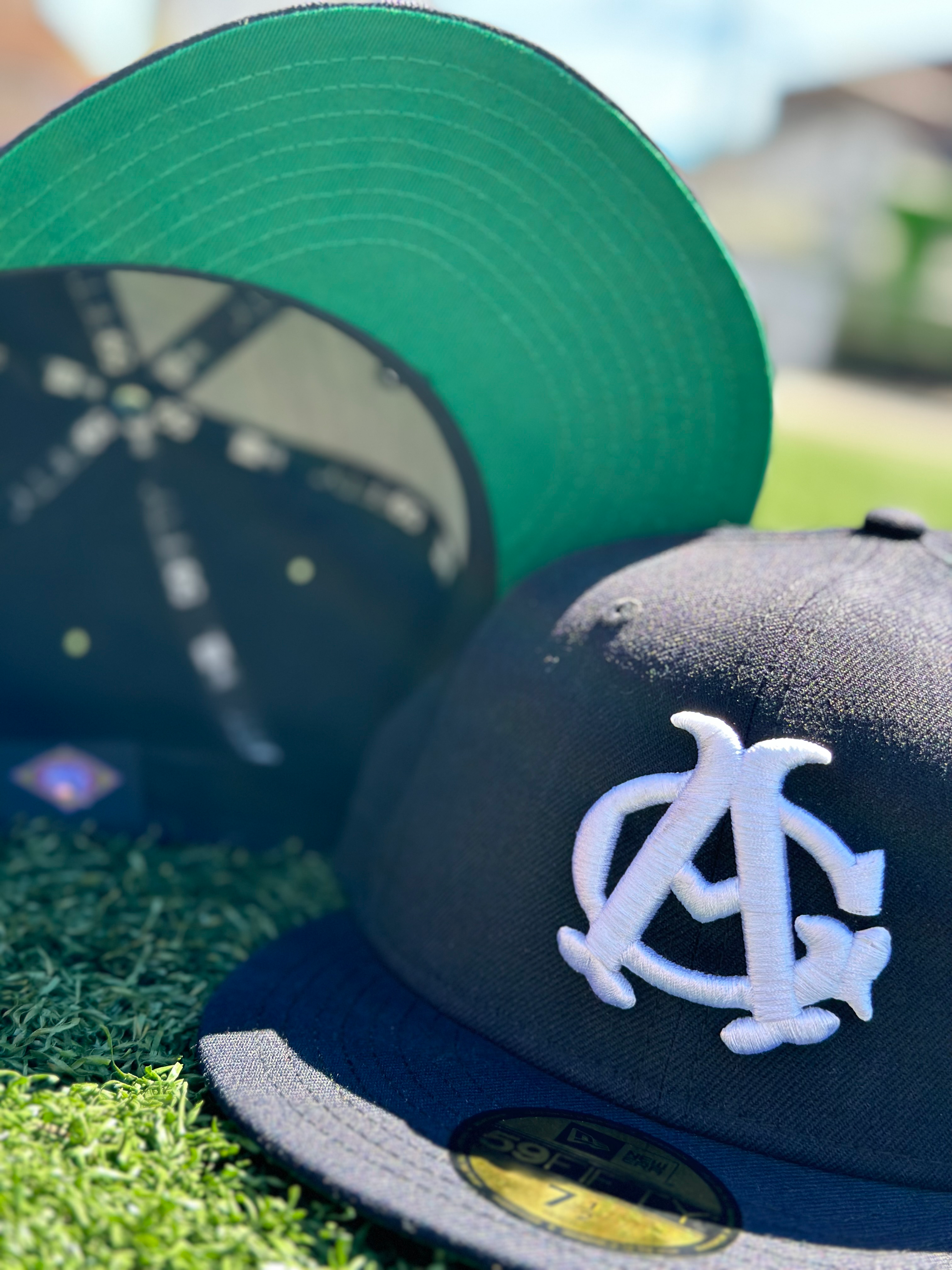 Chicago American Giants Negro League Team 59Fifty Cap. Navy Cap with Chicago American Giants logo on front. Green Undervisor
