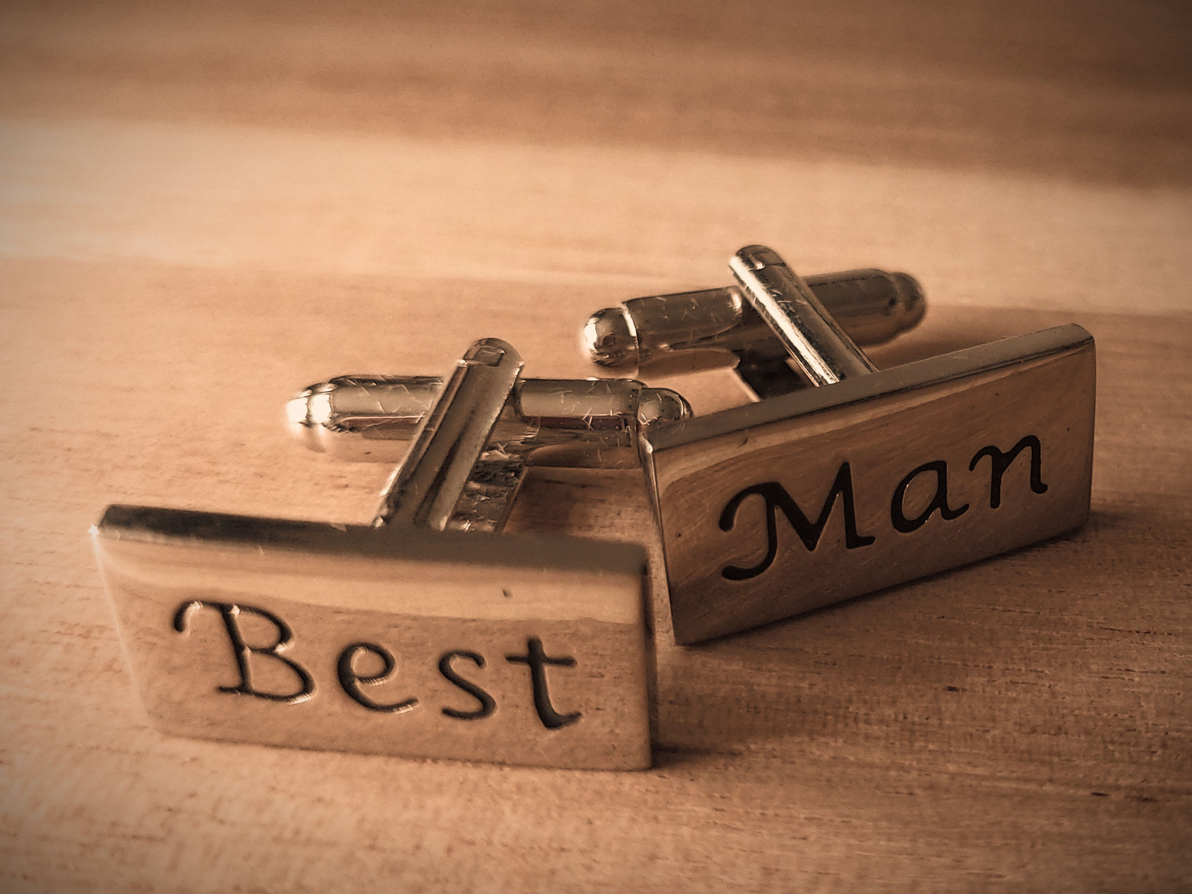 Silver rectangular cufflinks engraved with Best Man text