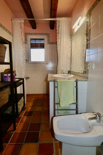 Bathroom with sink, bidet and toilet