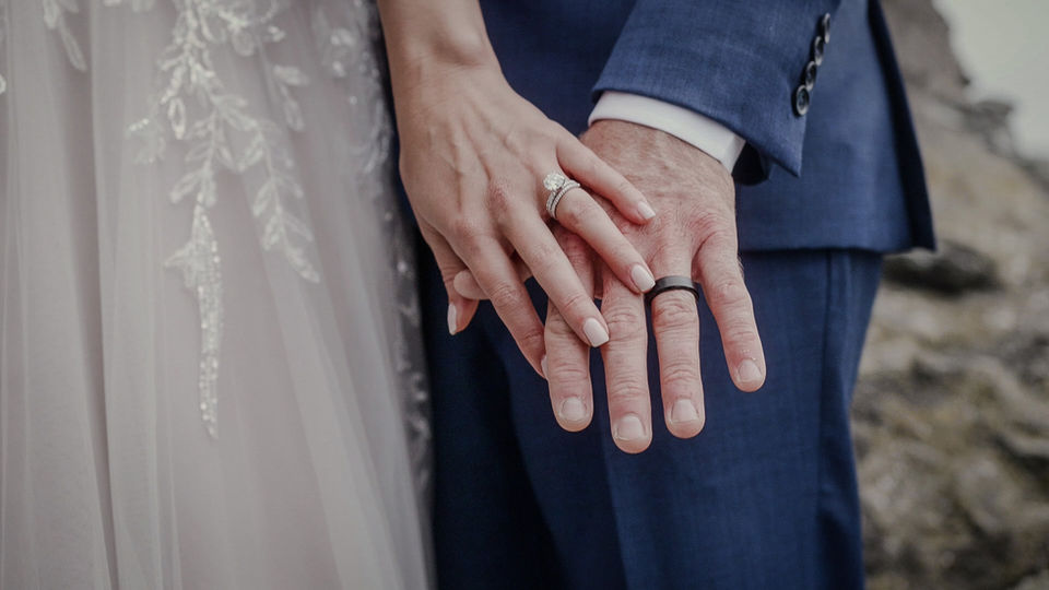 Entwined Wedding Videography Los Angeles CA Bride and Groom wedding rings holding hands