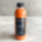 Cold-pressed juice for detox made from carrot, apple, and lemon used in The Camp’s fasting program