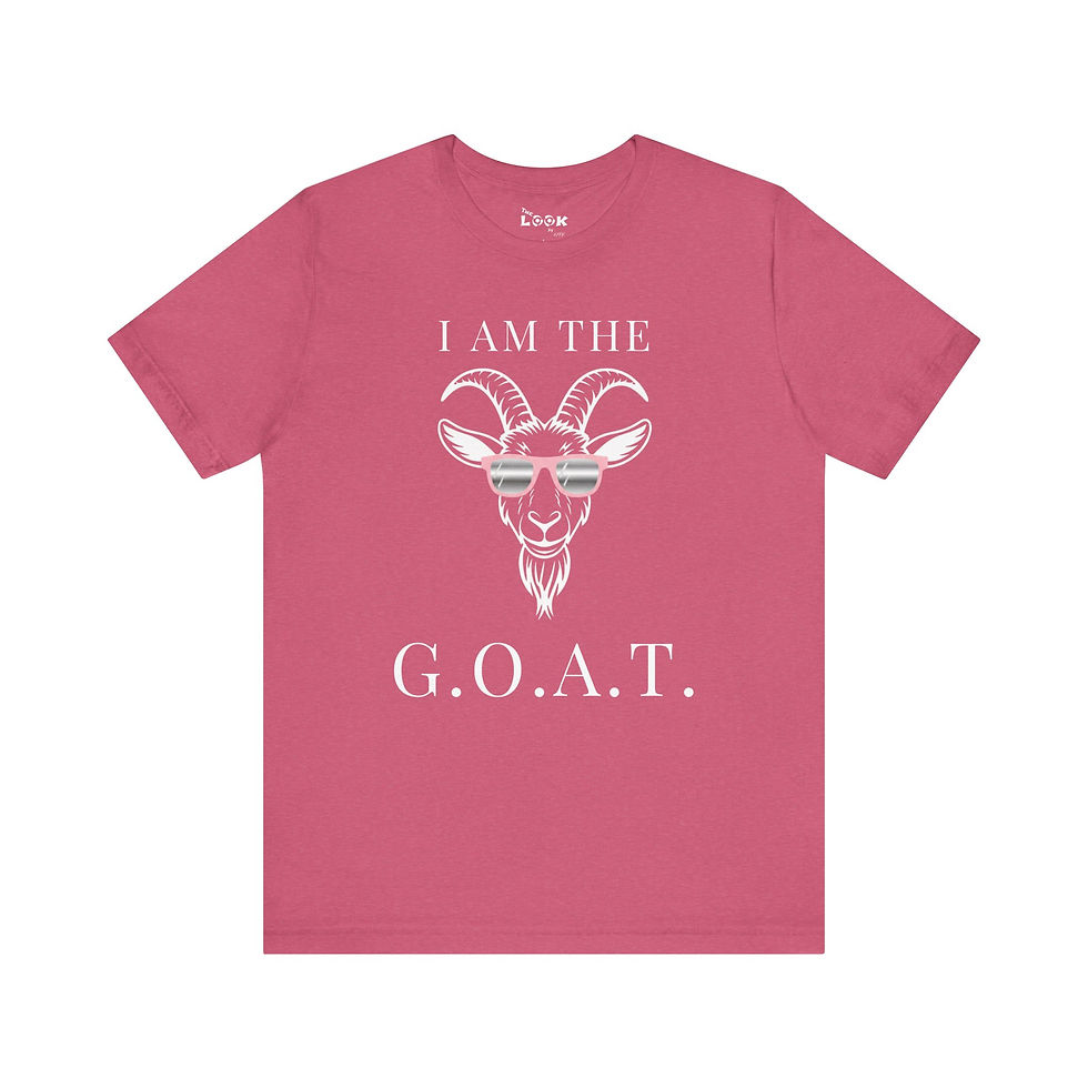Thumbnail: Front view of pink I Am The GOAT t shirt with goat head sunglasses graphic and G O A T text