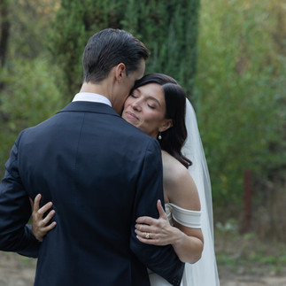 wedding couple calmly hugging