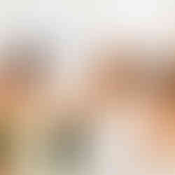 film photo of bride and her maid of honor holding parasols