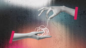 A pair of hands untangling a piece of string