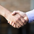 closeup-two-business-men-shaking-hands.jpg