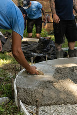 Viking concrete employees laying concrete sidewalk