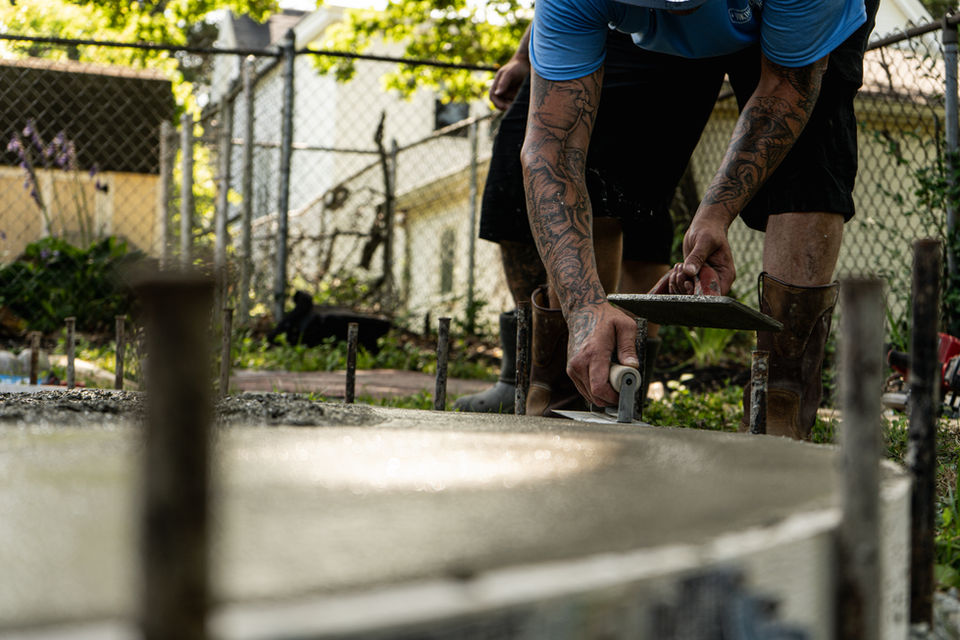 Viking concrete workers pouring concrete