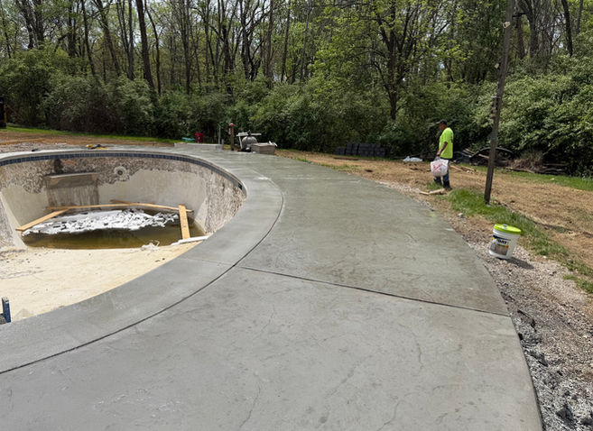 new concrete for backyard pool