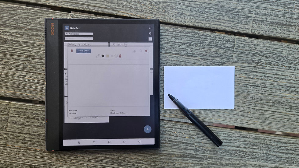 Close-up view of a smartphone with a productivity app showing organized digital cards
