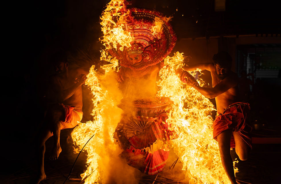 Theyyam jumping through fire