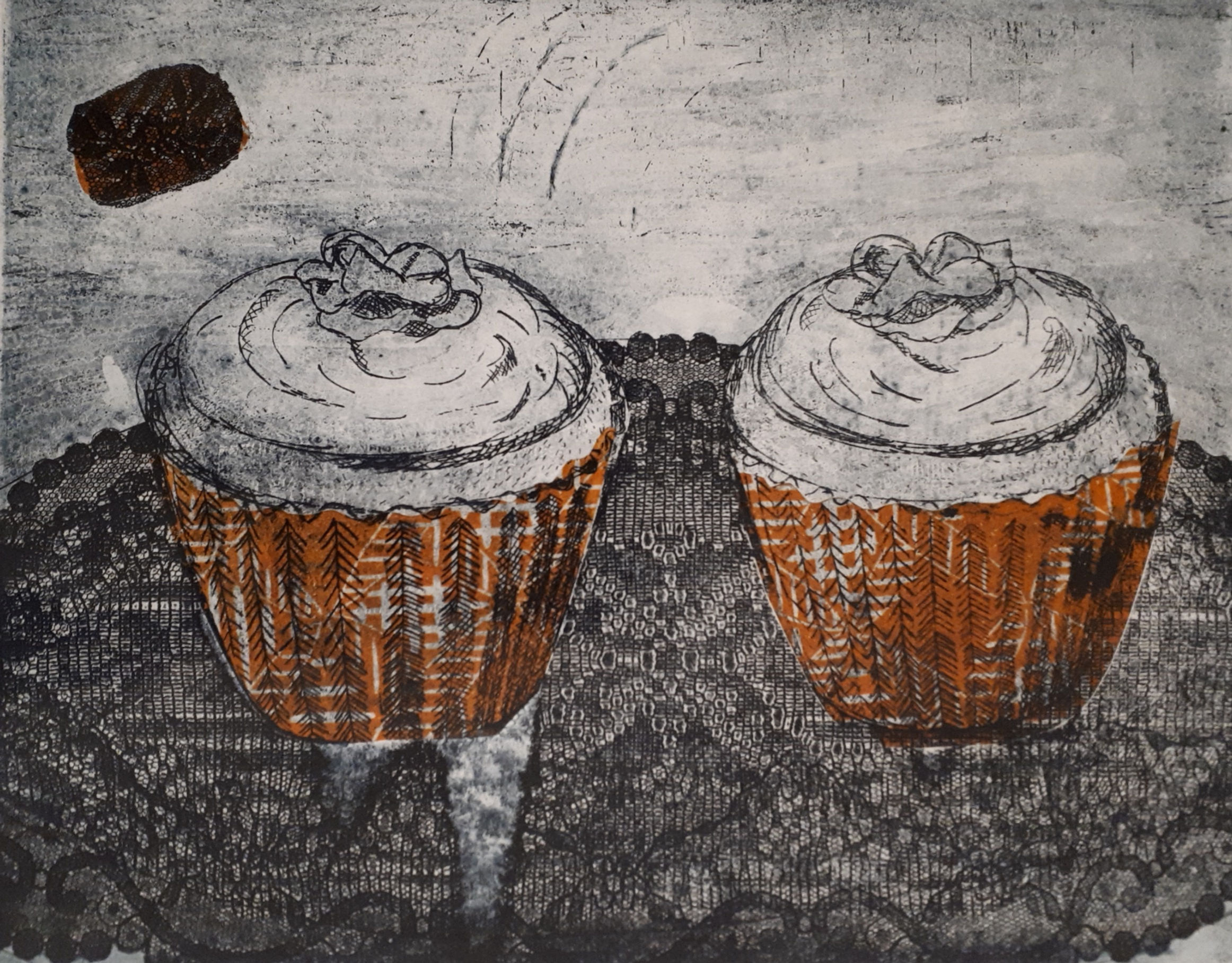 Pair of orange cup cakes