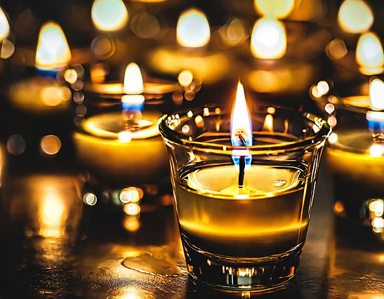 Firefly floating lit wick in a shot glass filled with oil. Dramatic lighting, closeup. Man
