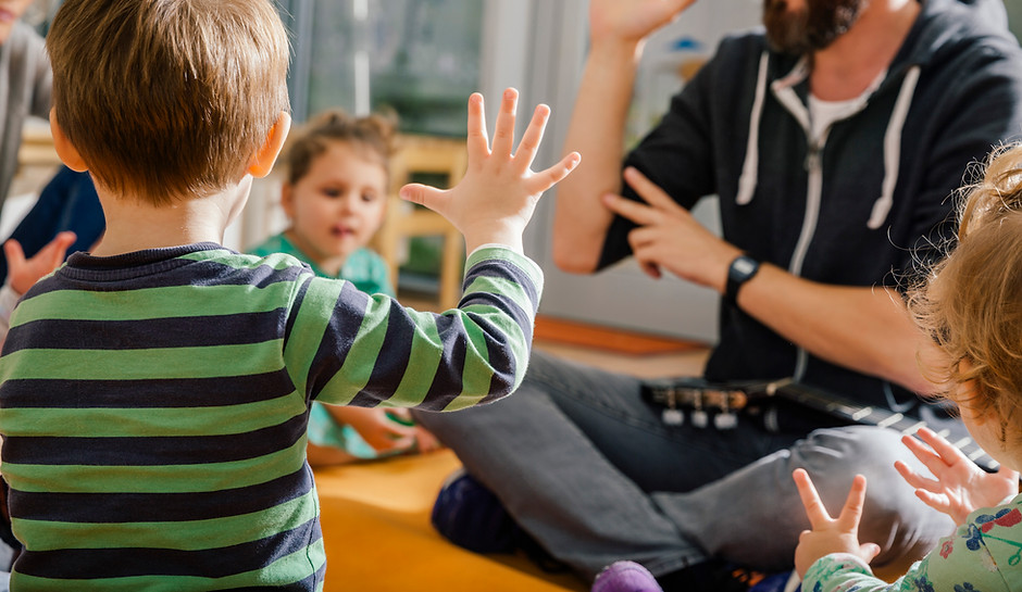 Children and Teacher in Kindergarten