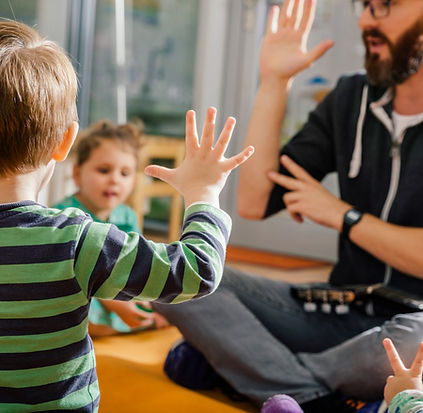 Children and Teacher in Kindergarten