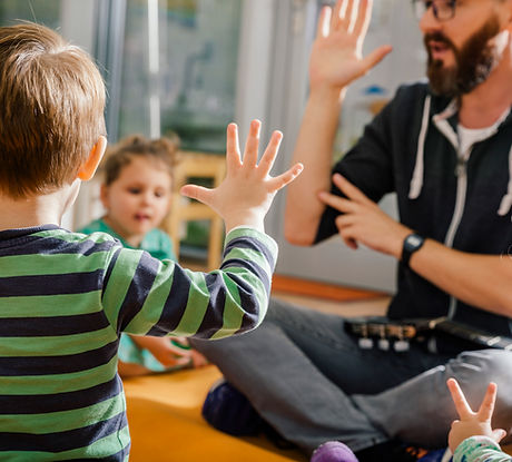 Children and Teacher in Kindergarten