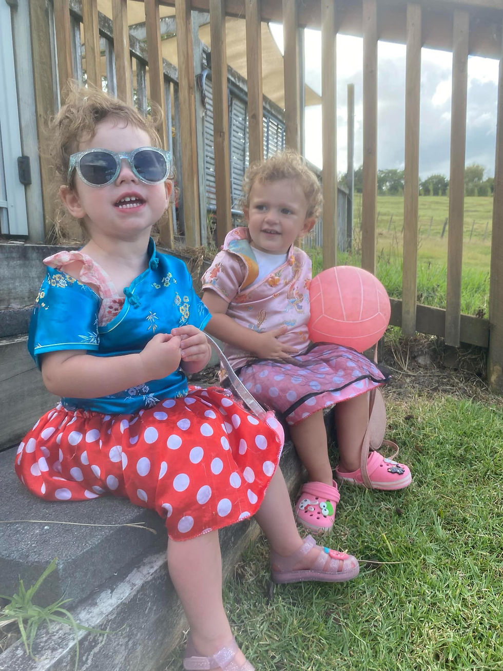 Teina kids enjoying outdoor grass.jpg