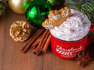 Mug with whipped cream with cinnamon on top