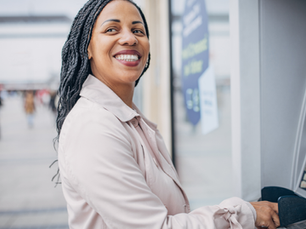 Black Women in front of atm