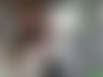 someone covering the pin pad at an atm