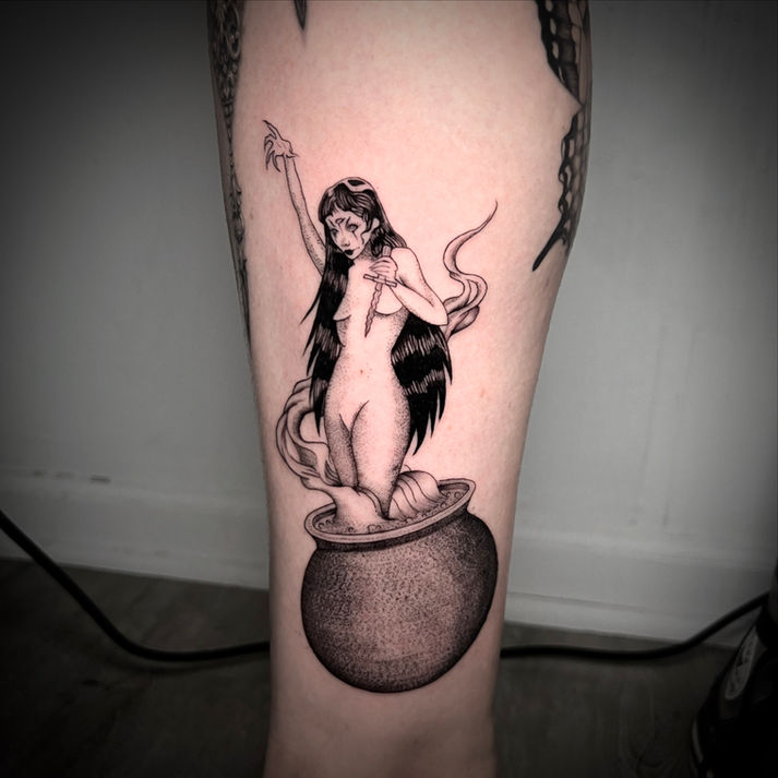 fine line blxck work illustrative tattoo of a witch girl in a cauldron