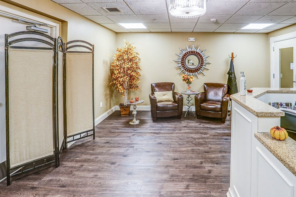 Salon waiting area at Chateau at Heritage Square offering on-site hair and grooming services for residents