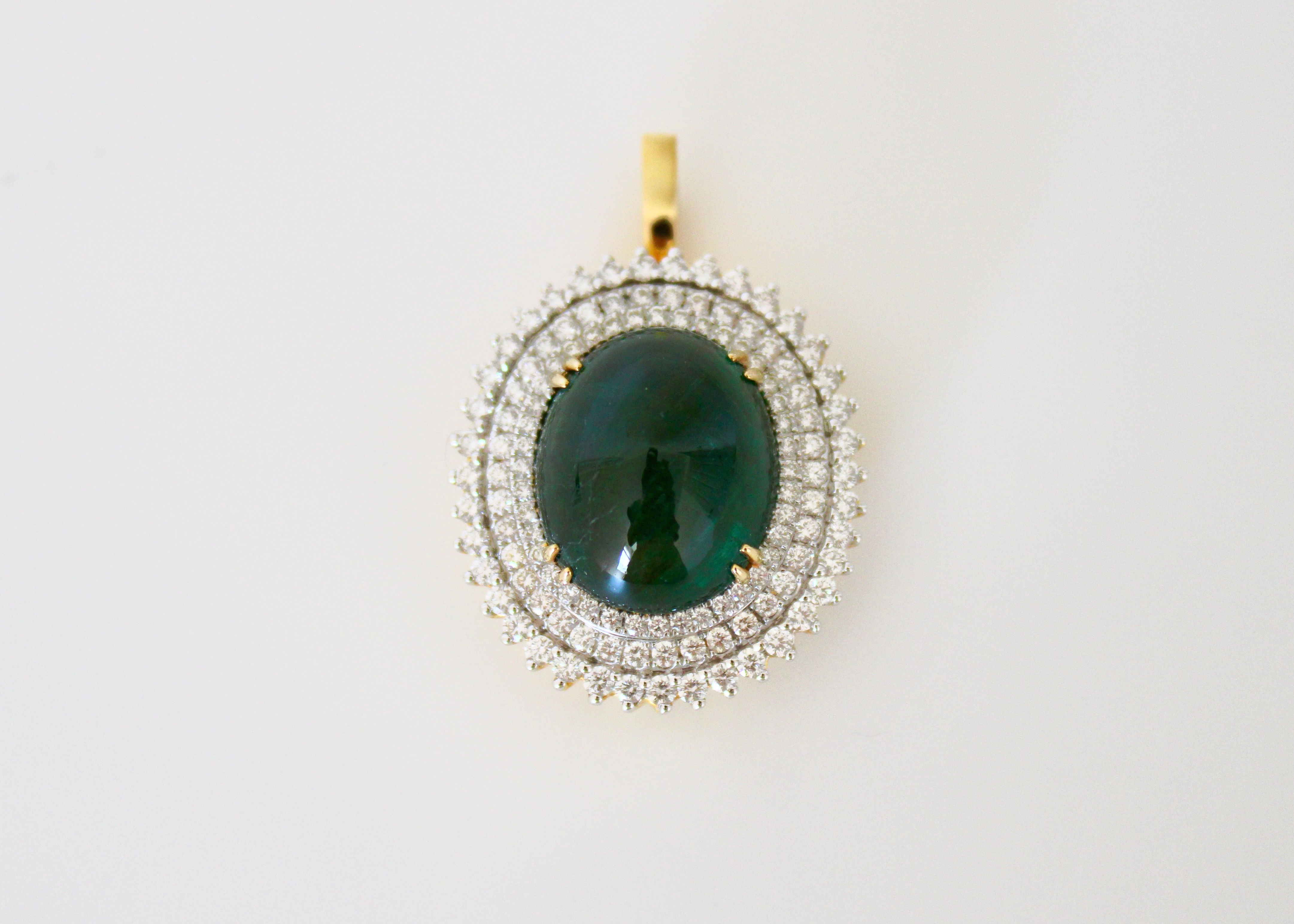 Emerald ring& pendant set with diamonds and 18k yellow gold