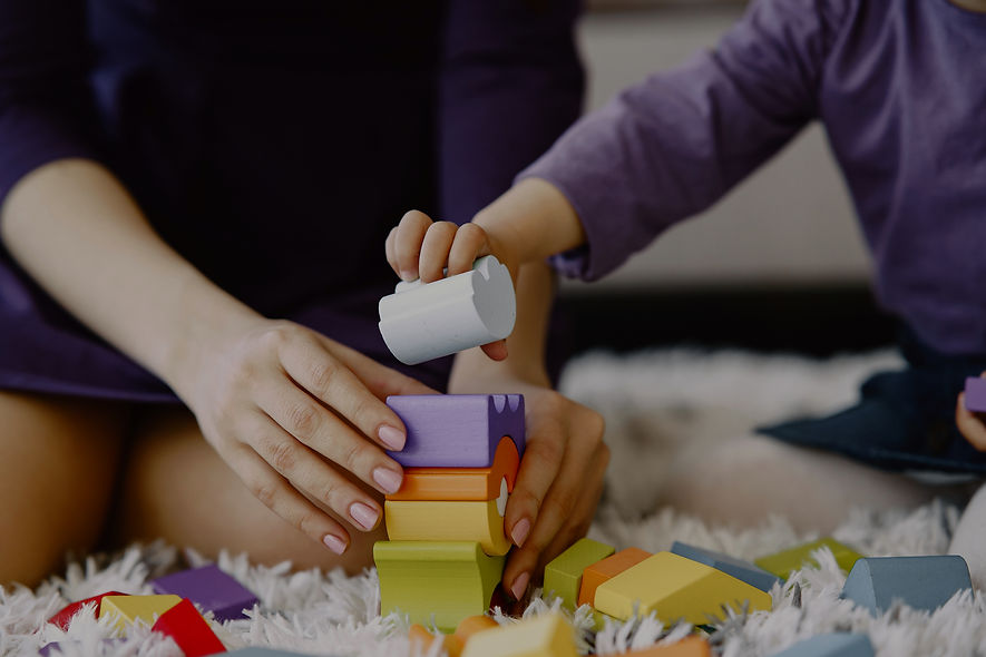 cheerful-mom-playing-laughing-with-little-kid-daughter_edited.jpg