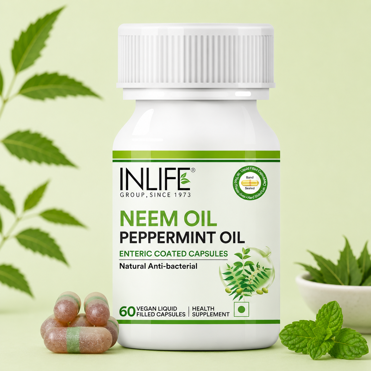 **Alt Text:** Inlife Neem Oil with Peppermint Oil Capsules containing 350 mg Neem Oil and 150 mg Peppermint Oil to support di