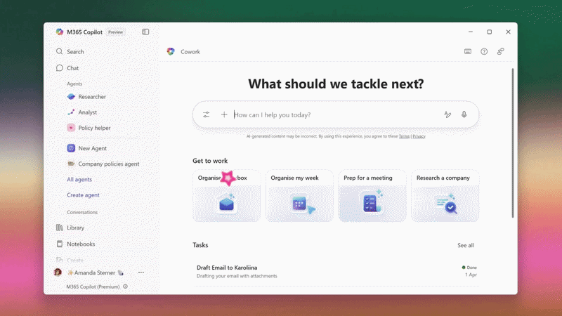 M365 Copilot Cowork interface displaying task suggestions like 'Organize my box' and 'Prep for a meeting'. Search bar and agent options visible.
