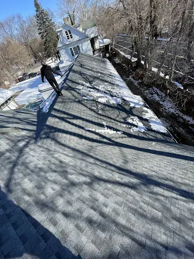 Roof Inspection in the winter by armstrong roofing llc