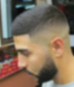 Clean cheek line-up and beard trim with razor detailing in Franklin Square