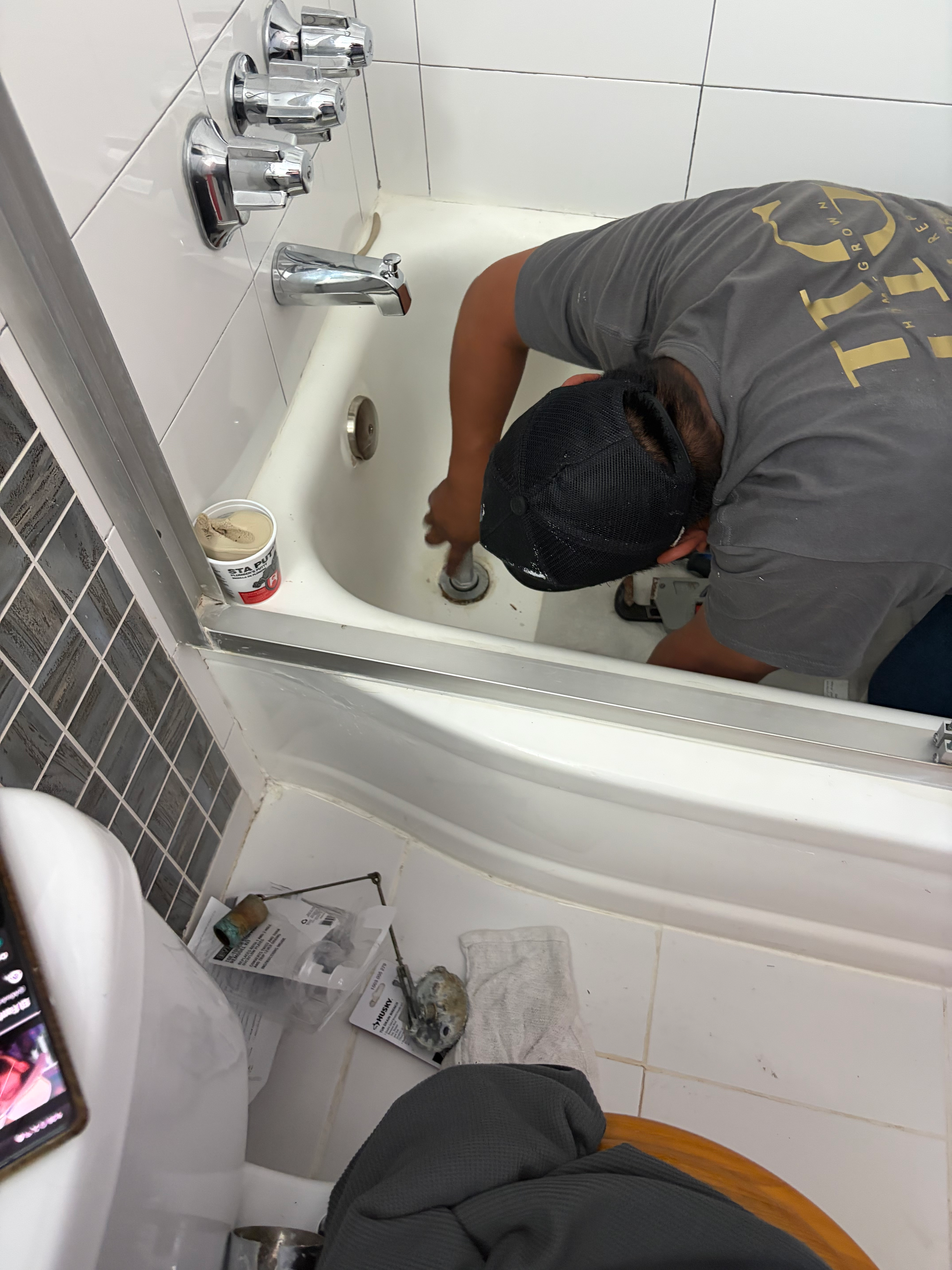 Bathtub fixture replacement in Bergen County, NJ — HomeGrown handyman swapping out aged tub hardware on a single-task visit