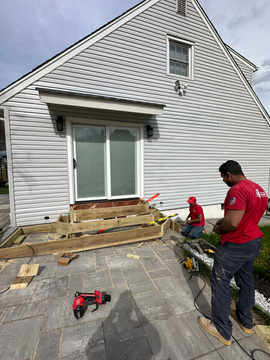 Initial construction of the back porch steps by Innovative Home Improvement.