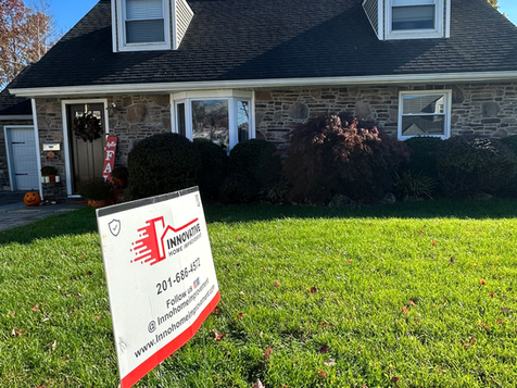 Front view of a house renovated by Innovative Home Improvement.