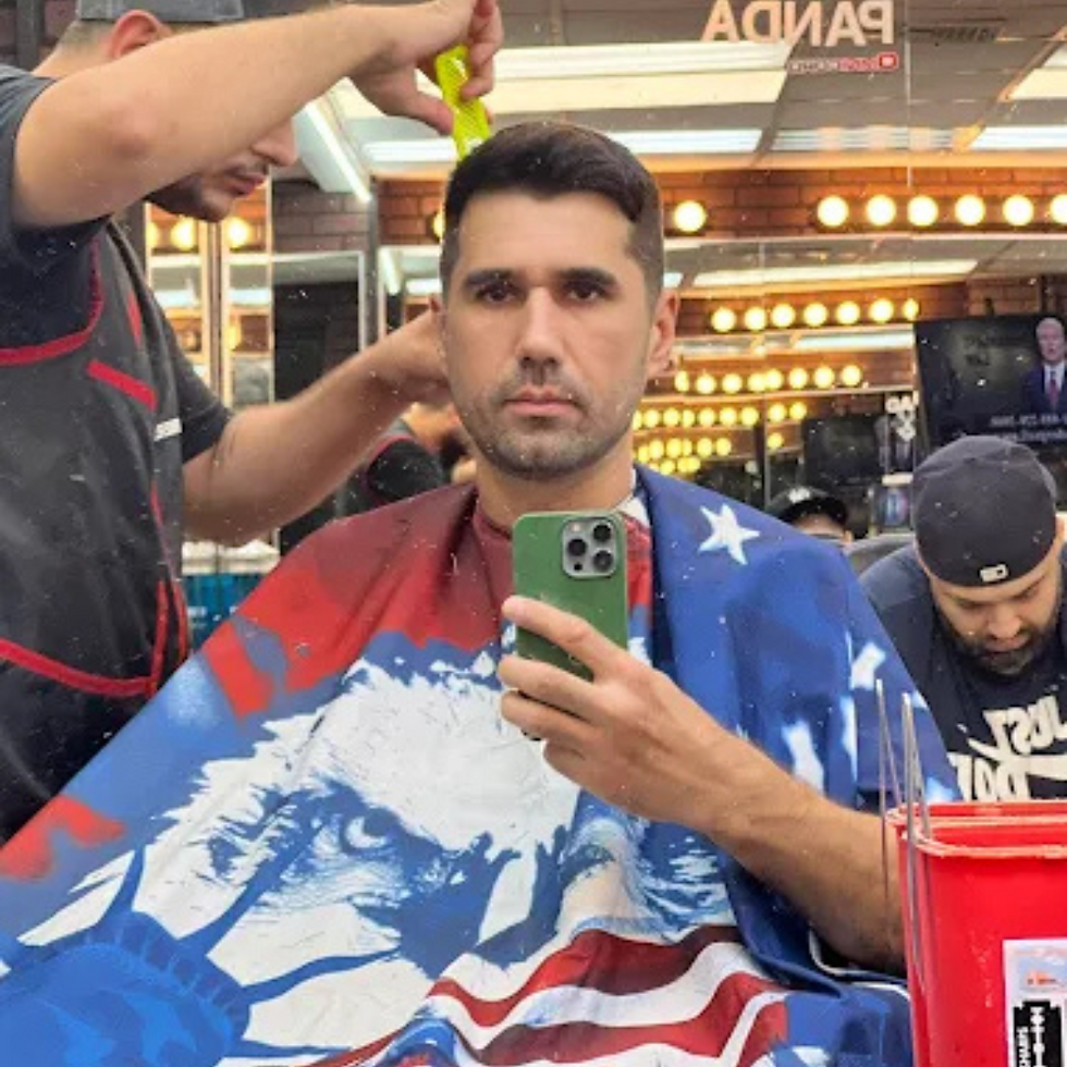 Light blonde high skin fade with line design by New York Master Barbers near Stewart Manor