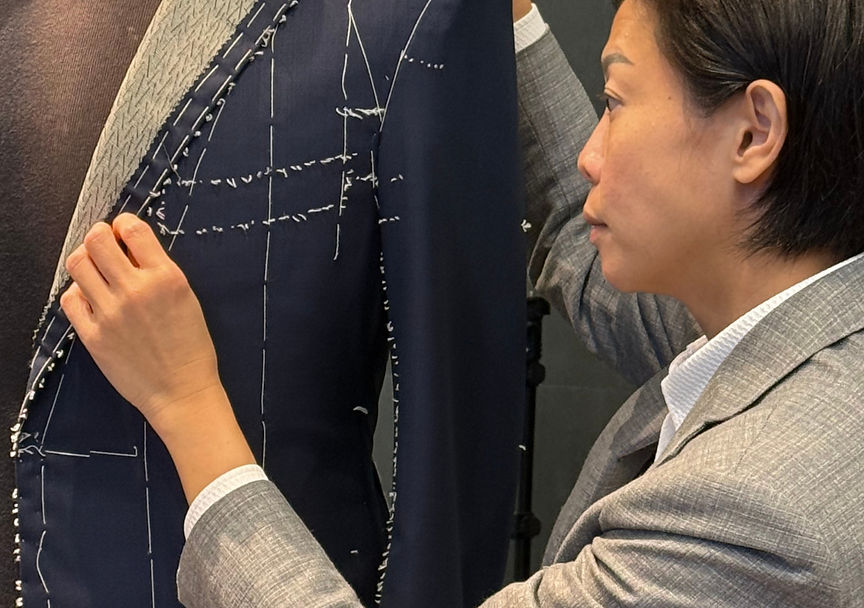 Hand making a sartorial jacket, sculpting curves and contours to fit the wearer’s silhouette.