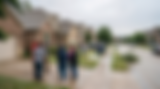Residents inspecting property damage after hail storm