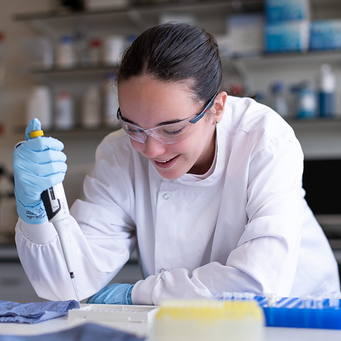 A student doing pippeting skills