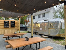 An Ice Cream trailer outside