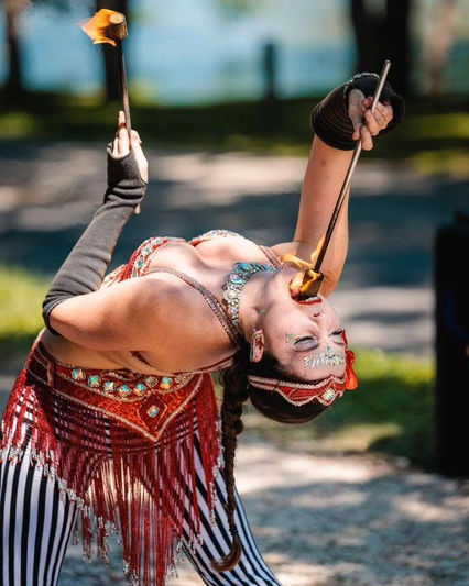 Mystica Fay aka Mystica Fae or Mystica Faye or Mystica Fiora fire dancing with fire eating at a camping festival