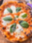 Margherita pizza with fresh basil and mozzarella