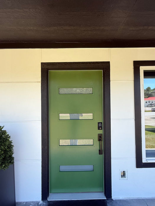 Exterior front door project completed by 74 Painting in Willis, TX