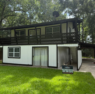 black and white exterior residential painting project completed in Conroe, TX by 74 Painting